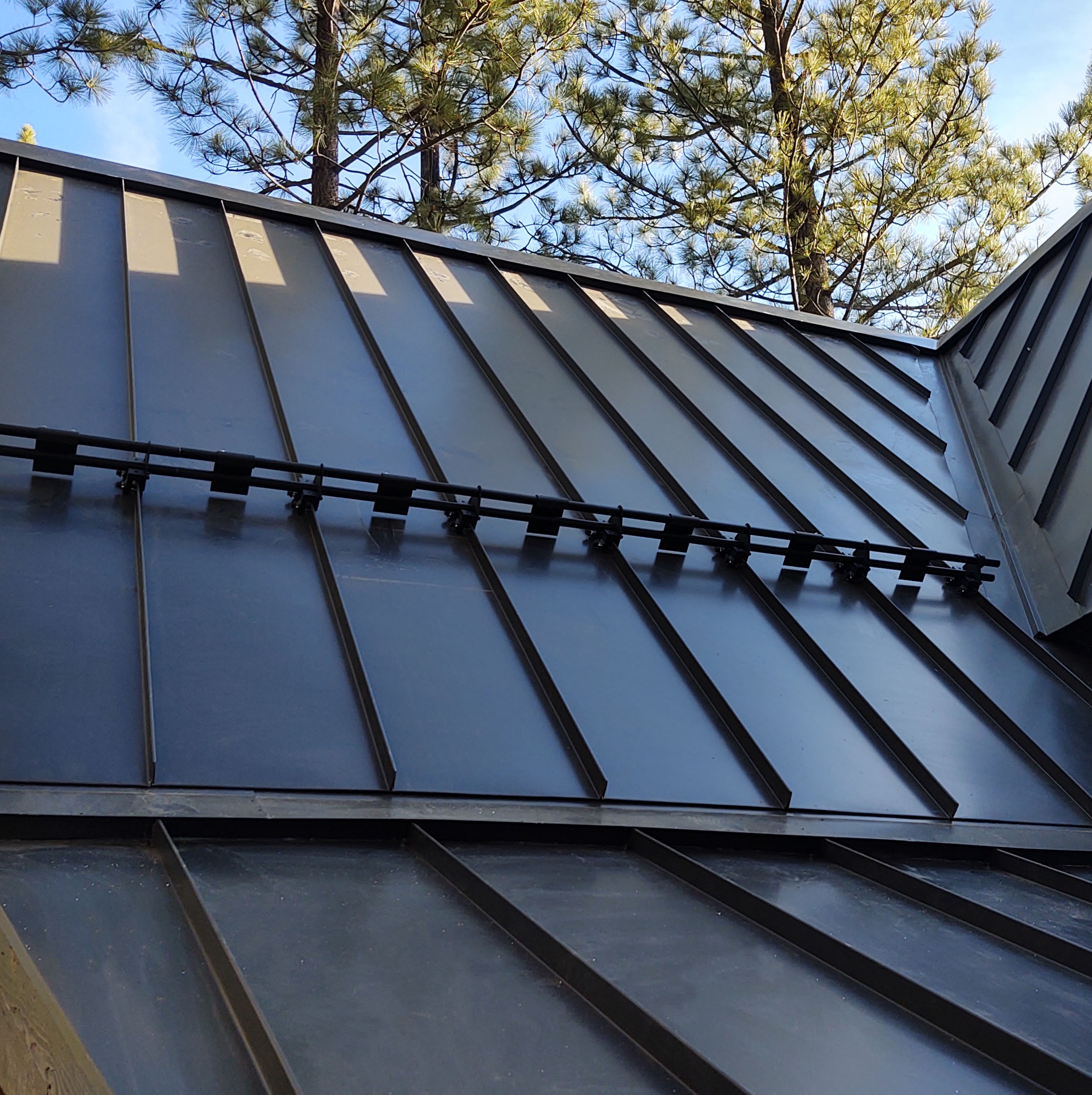 Standing Seam vs Metal Shingles for Heron Ridge Homes